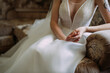 The image shows a woman holding her belly while wearing a wedding dress 6939.