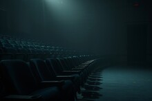 Dimly Lit Theater Seats Creating A Mood Of Suspense And Awaiting An Unseen Performance, Ideal For Dramatic Backdrops.

