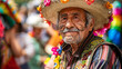 Elderly Mexican Man Warm Smile face painting Wearing Traditional Sombrero and Poncho Cinco de Mayo parade blurred background