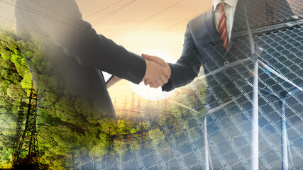 Double exposure graphic of business people working over wind turbine farm and green renewable energy worker interface. Concept of sustainability development by alternative energy.