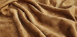 A rich, suede fabric texture pattern, where the soft nap of the material is rendered in a warm. 32k, full ultra HD, high resolution