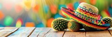 Cinco De Mayo Holiday Background With Mexican Cactus And Party Sombrero Hat On Wooden Table
