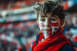 child boy soccer fun with painted face of flag England in football stadium
child boy soccer fun with painted face of flag England in football stadium
