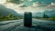 Car Tire on Cracked Road in Mountainous Sunset