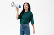 Beautiful Asian woman holding megaphone and shout on white background.