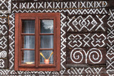 Fototapeta Perspektywa 3d - Painted folk house, UNESCO village Cicmany in Slovakia