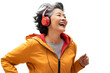 Middle aged Chinese woman  listening music with headphones on isolated chroma key background