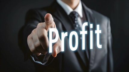 Wall Mural - Businessman pointing in to word “Profit”, returns from investments and doing business