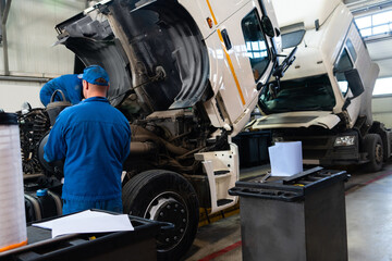 Poster - Truck repair service indoors. Maintenance workshop.