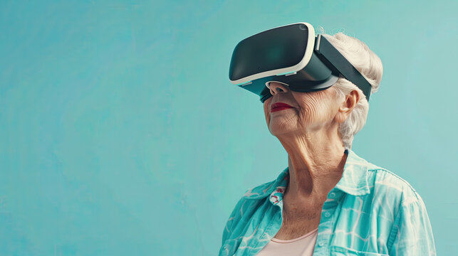Waving Senior woman wearing VR headset on blue background
