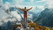 Hiker blissful with arms raised in the sky after hiking