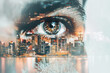 A blurry eye with a city in the background