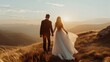 © GB - Bride and groom at a mountain overlook, concept of eloping and destination weddings