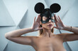 sexy woman in black role play game mouse mask, female in kinky leather facial accessory, role play games
