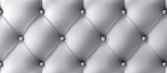 Sticker - A closeup of a grey tufted leather wall with metal buttons, featuring a symmetrical pattern in monochrome colors with an electric blue accent