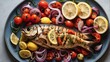 top-down image of a flavorful Mediterranean meal featuring grilled fish, onions, tomatoes, and lemons