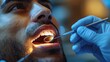 The image features an extreme close-up of a male patient's open mouth as a dentist conducts a thorough dental examination, with a dental mirror in use.