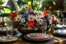 Colorful Flower Arrangement On A Festive Table Setting With Patriotic-themed Plates.