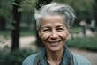 © CreativeCanvas - Joyful Woman with Silver Hair in a Park Setting. Generative AI