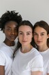 An intimate portrait of three diverse women, united in white, symbolizing the pure essence of equality, unity, and solidarity.