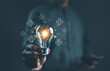 Innovation and idea generation concepts. Person holding a lightbulb with glowing plus signs, symbolizing creative ideas and innovative thinking. smart business intelligent creativity with bulbs,
