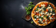 Top view of spinach and feta pizza with tomato sauce, mozzarella, spinach, feta, and garlic, with copy space, dark concrete background Menu concept. Delicious tasty Italian food diet