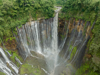 Wall Mural - Aerial view of Tumpak Sewu Waterfall in East Java, Indonesia