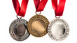 © Ziyan - real Gold, silver and bronze medals hanging on red ribbons isolated on white background.
