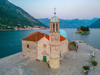 Wall Mural - Sunset aerial view of Church of Our Lady of Skrpjela and Saint George Catholic Monastery near Perast in Montenegro