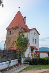 Canvas Print - Sunset view of the Cizmarilor tower in Sighisoara, Romania