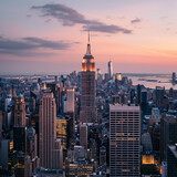 Fototapeta  - Sunset Over New York City Skyline with Iconic Skyscrapers