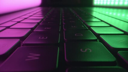 Wall Mural - close up of rgb gaming laptop keyboard. coding and big data. digital innovation protection technolog