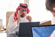 arabic male using phone during work to make sure it is flow is in the right direction