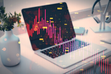 Sticker - Close up of laptop on desk with vase and plant, supplies and downward red forex chart with map, grid and index on blurry background. Financial crisis and recession concept. Double exposure.