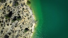 Lac De St Croix In The Gorges Du Verdon, Vertical View Made By Drone In 4k 60fps View Of The Turquoise Water And The Beaches Of The Lake. Famous Tourist Site