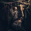 Close-up portrait of Jesus Christ with a crown of thorns, evoking a sense of reverence and solemnity.