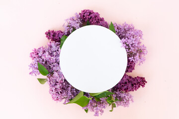 Sticker - Fresh lilac flowers over pink background with copy space, flat lay floral composition