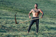 Topless farmer. Sexy farmer. Seductive guy on nature. Handsome shirtless farmer in nature. Muscular male fit body. Muscular farmer. Muscular male torso, bare shoulders.