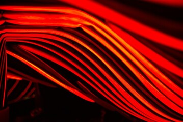 3d rendered illustration of red bright smooth lines isolated on a black background