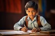 © venusvi - Indian boy studying in school An attentive atmosphere, children learn with interest