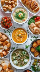 Wall Mural - A top view of a table covered with a diverse selection of food items, including fruits, vegetables, meats, and bread