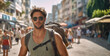 young adult man in muscle shirt with muscular body and sunglasses in a tourist street with many tourist people, fictional place
