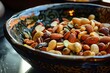 A bowl of mixed nuts focusing on the variety of shapes
