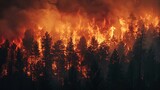 Fototapeta  - Dynamic image of a wildfire raging through a forest exacerbated by dry conditions and extreme heat