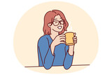 Fototapeta Kwiaty - Joyful woman holding coffee mug sitting at table and smiling remembering happy moments from life during lunch break. Girl in casual clothes drinks hot tea or coffee to gain vigor and energy