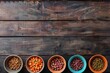 Wet pet food in bowls on wood background room for text