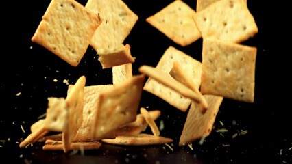 Sticker - Super slow motion cookies with sesame seeds falls on the table. Filmed on a high-speed camera at 1000 fps. High quality FullHD footage