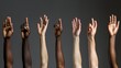 Group of diverse arms raised up hand up, hands raised in the air. Concept of Social diversity for global equality and peace with colorful people hands.