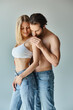 © LIGHTFIELD STUDIOS - A sexy couple in a passionate embrace, embodying love and connection.