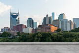 Fototapeta Miasto - Skyscrapers Cityscape Downtown, Nashville Skyline Buildings. Beautiful Real Estate. Day time. Empty rooftop View. Success concept.
